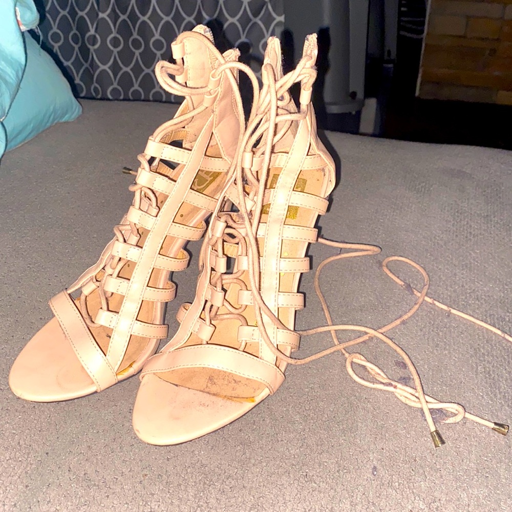 High heeled nude colored womens shoes; size 7.5